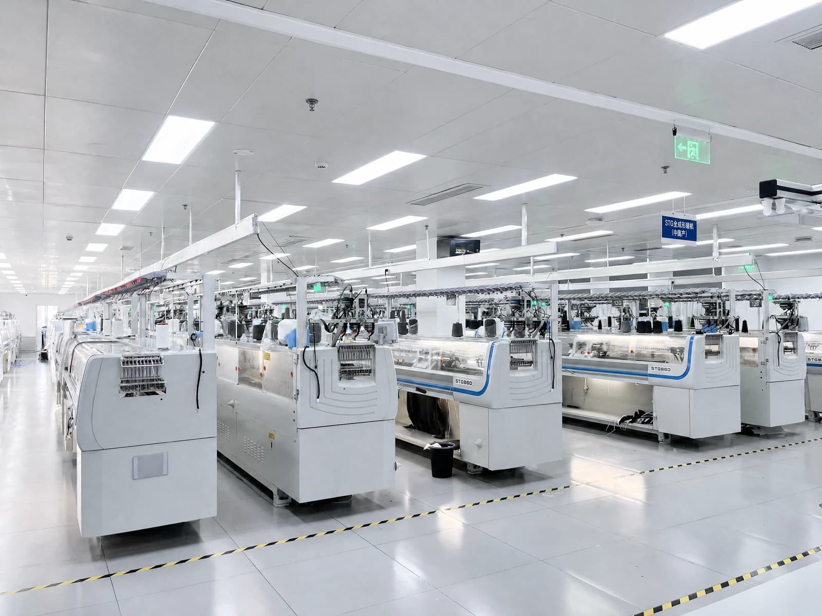 Computerized flat knitting machine workshop