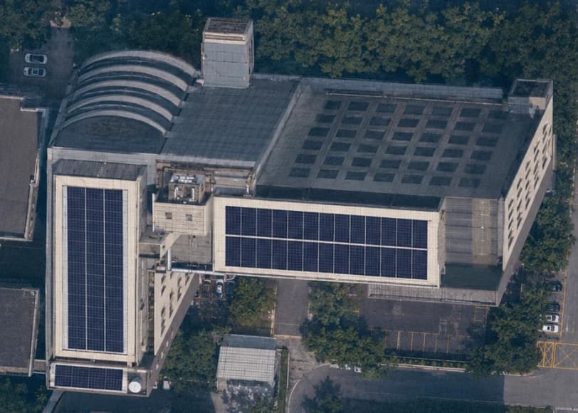 Solar photovoltaic panels on the factory rooftop